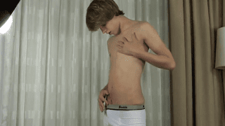 Cute twink in white briefs with a boner